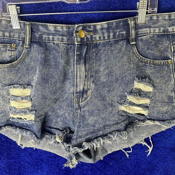 SHEIN Pants - Distressed denim shorts with ripped details #denimshorts‎